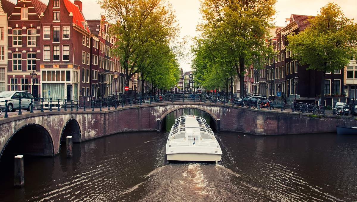 Cruise in the Canals in Amsterdam, Netherlands - Top things to do with your loved one on a romantic holiday in Europe - Low Cost Vibes Blog